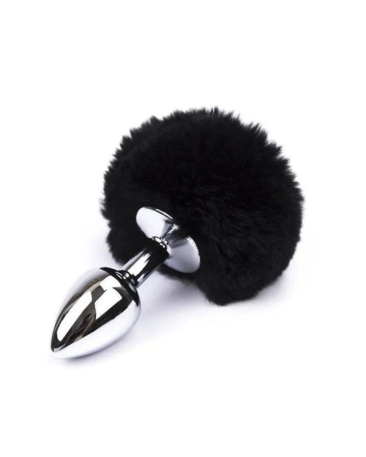 Plug Tália — aço polido e pompom de pelúcia